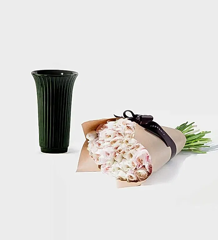 25 Stems of Ballet Slippers Italian Ranunculus in a 12cm Glazed Emerald Fluted Vase