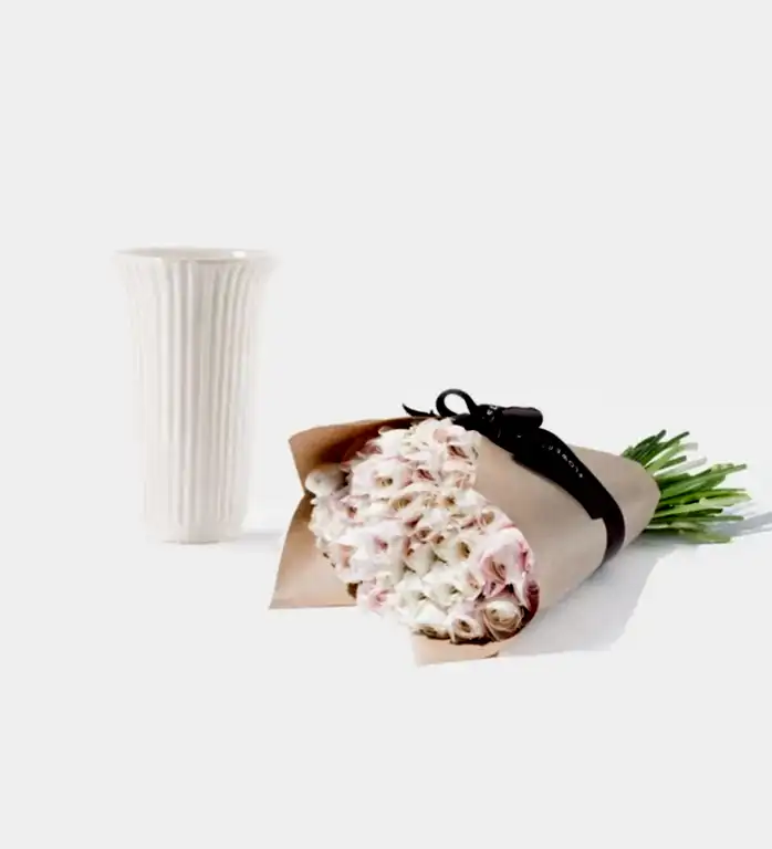 25 Stems of Ballet Slippers Italian Ranunculus in a 12cm Glazed White Fluted Vase