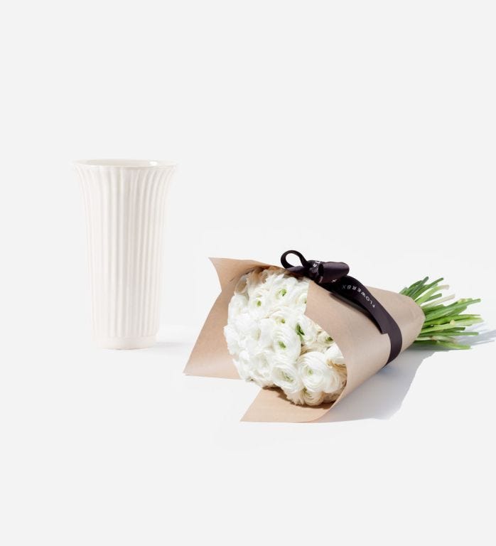 25 Stems of Chiffon Italian Ranunculus in a 12cm Glazed White Fluted Vase