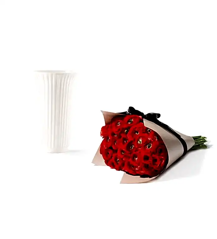 25 Stems of Red Velvet Italian Ranunculus in a 12cm Glazed White Fluted Vase
