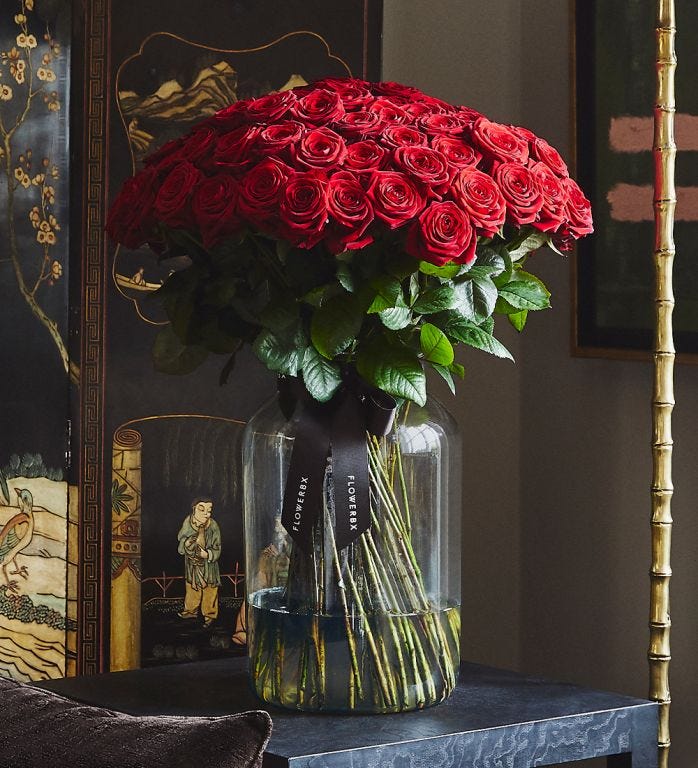 100 Red Naomi Roses in a Large Apothecary Vase